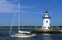 Lighthouse with Sail Boat